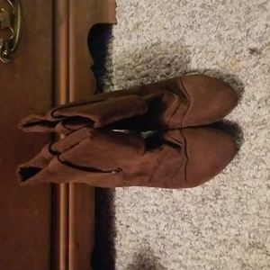 pair of Kathy Van Zeeland heeled boots.